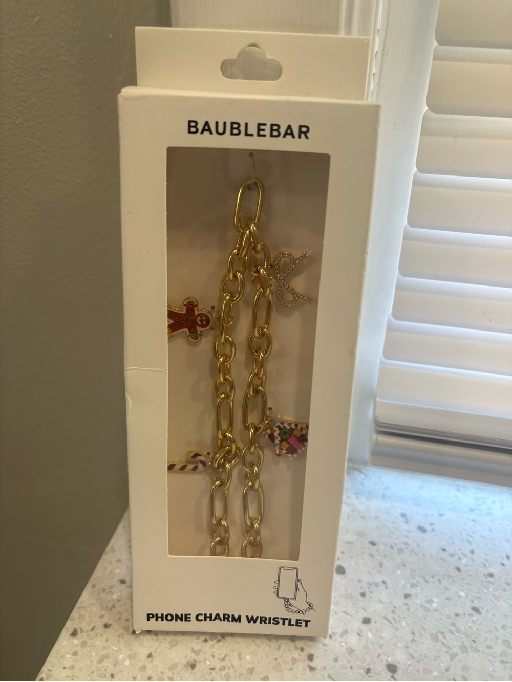 NIB BaubleBar Gold Phone Charm Wristlet with Festive Christmas Charms